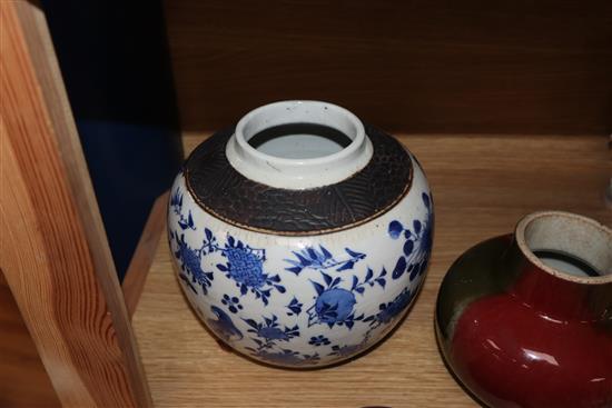 A Chinese squat baluster vase, crackle-glazed in green and red, a blue and white ginger jar and cover and a redware teapot